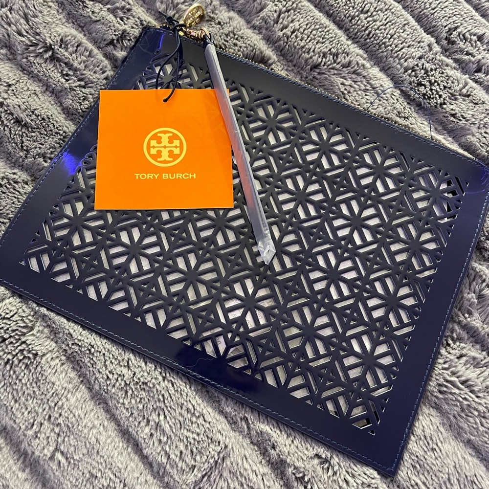 TORY BURCH large laser cut clutch/wristlet pouch.